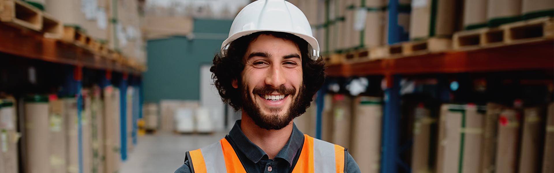 warehouse manufacturing professional smiling